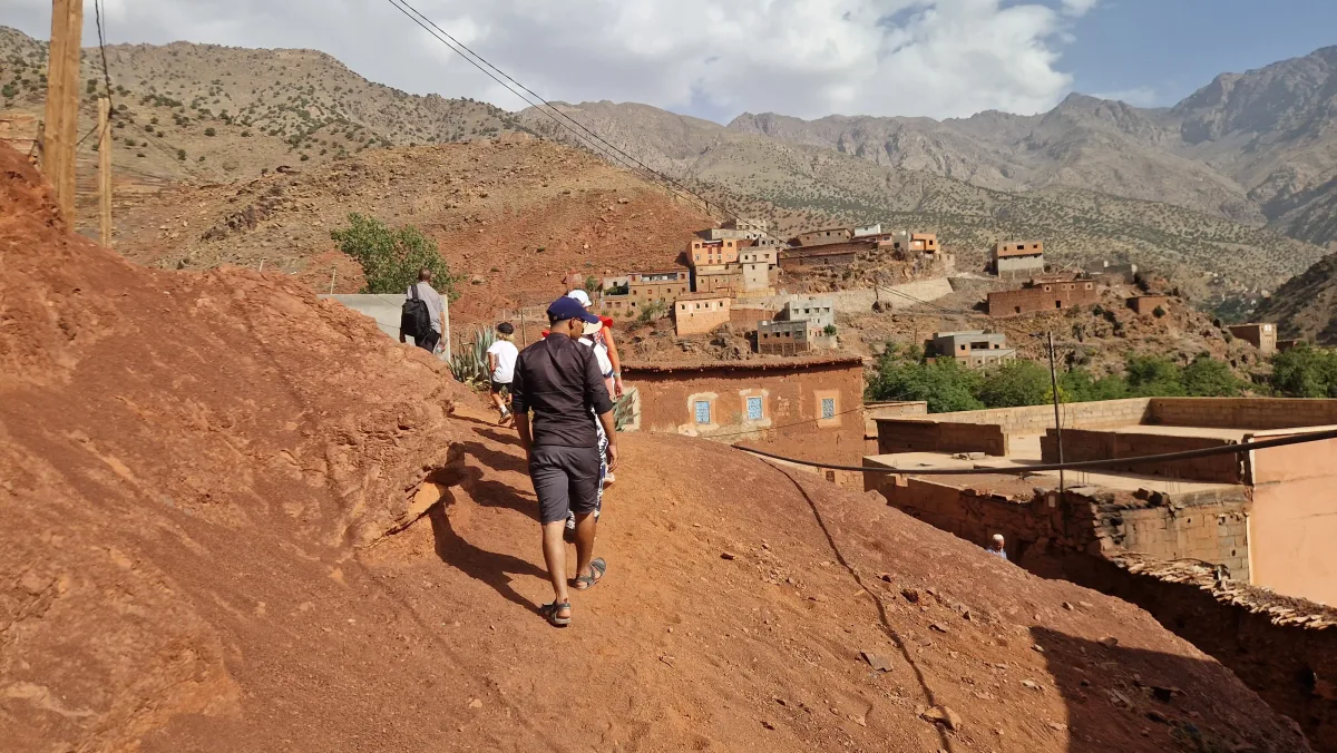 Trekkers on a village-to-village route beneath Mount Toubkal in the High Atlas